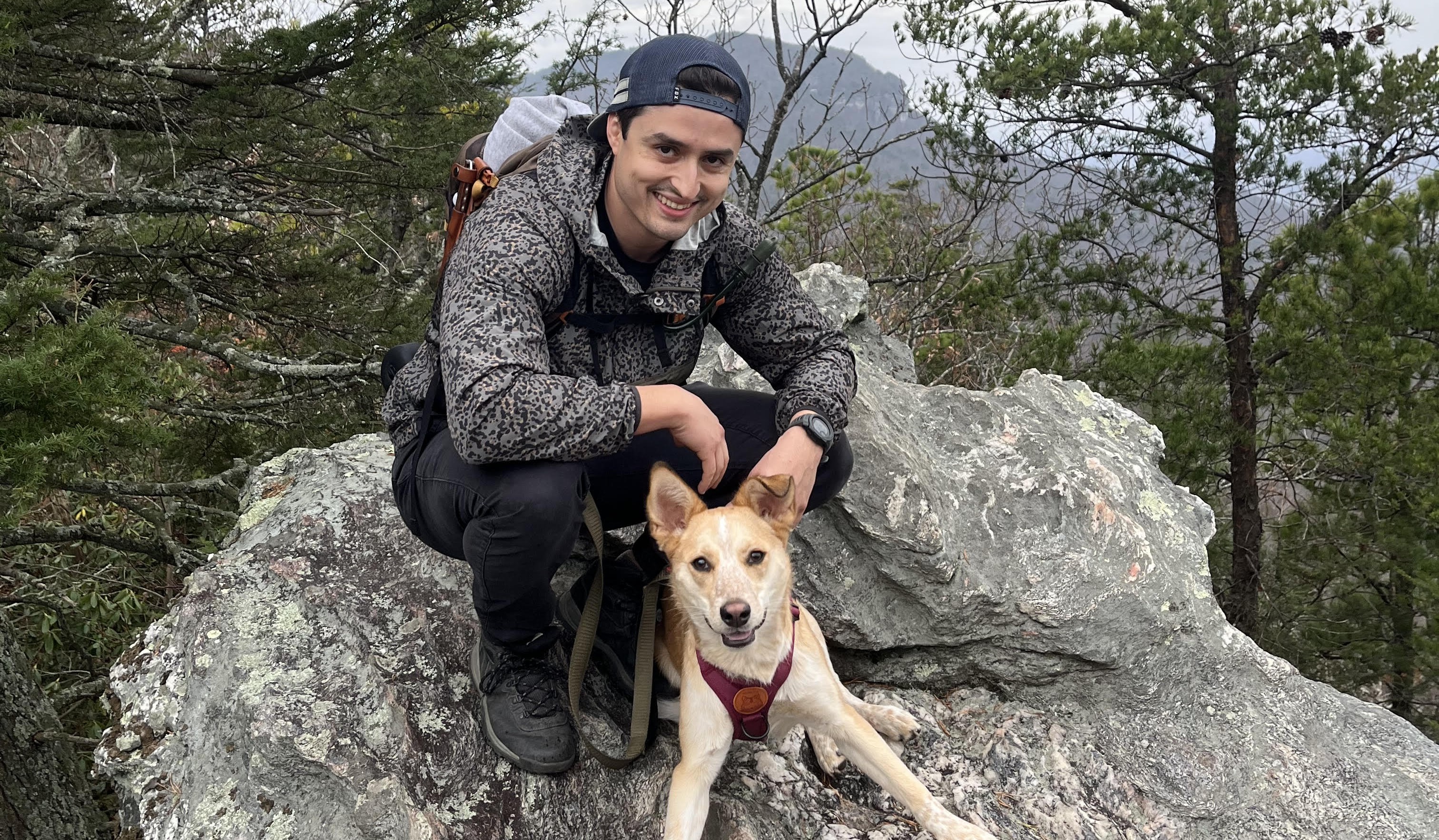 Michael and Tsula posing on a boulder at Hanging Rock Park, in North Carolina!